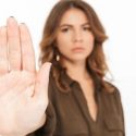 Woman holding her hand up to indicate stop. Contact C. Woods Company in Tyler, TX for HVAC needs