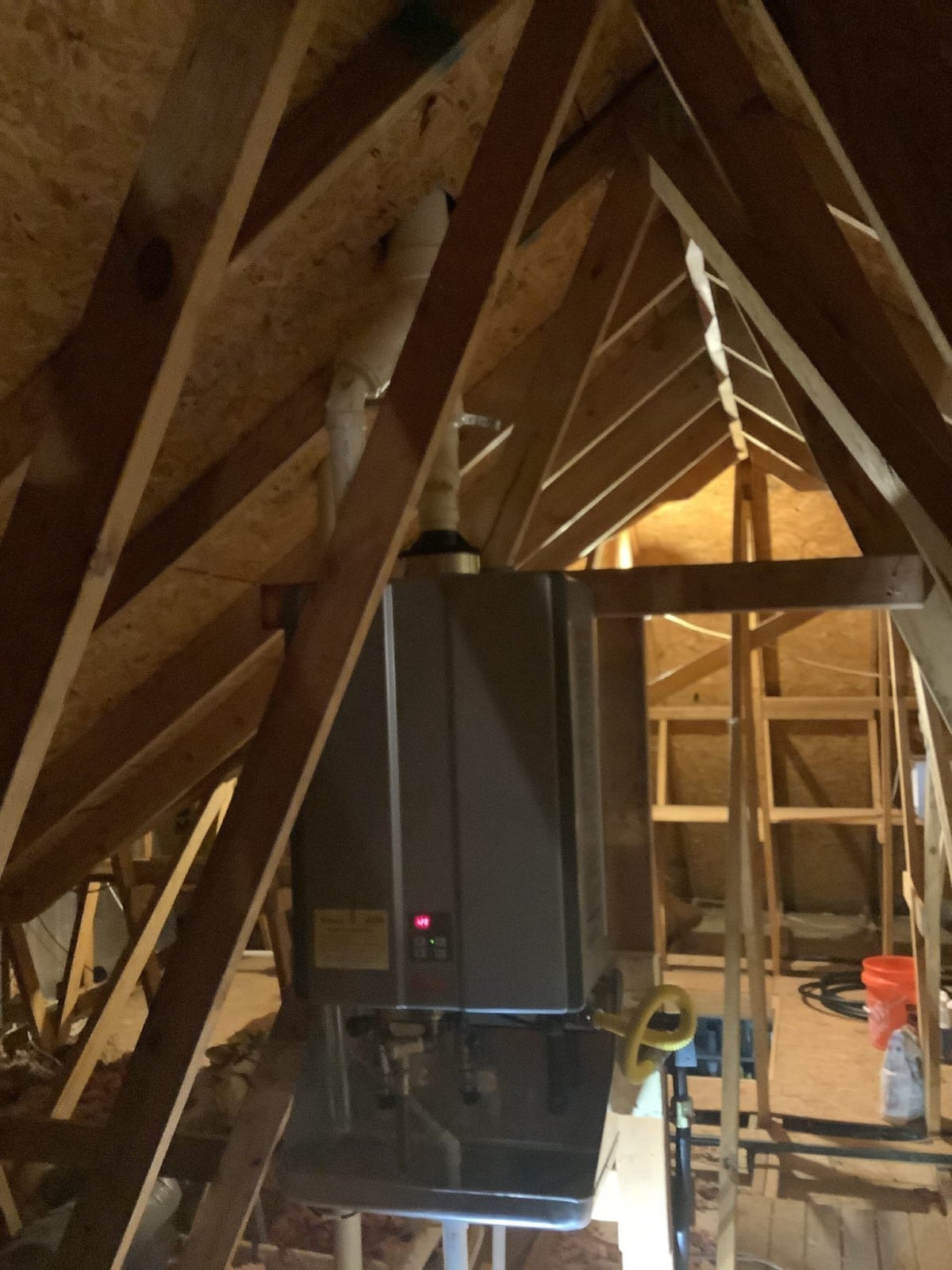 Heater installed in an unfinished attic space by C. Woods Company in Tyler, TX