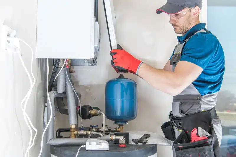 C. Woods Company HVAC tech performing HVAC maintenance in Tyler, TX