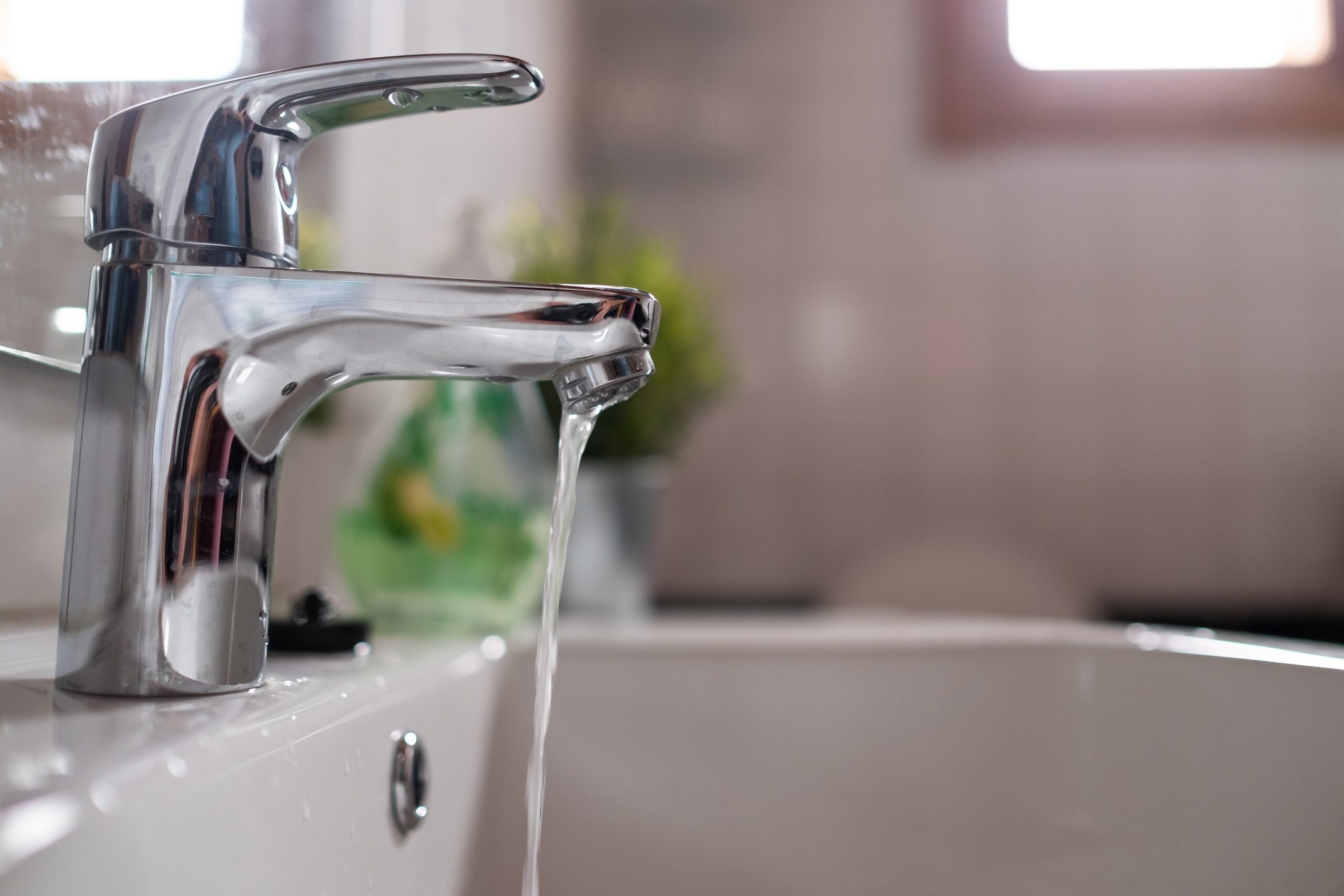 Open chrome faucet with low water pressure